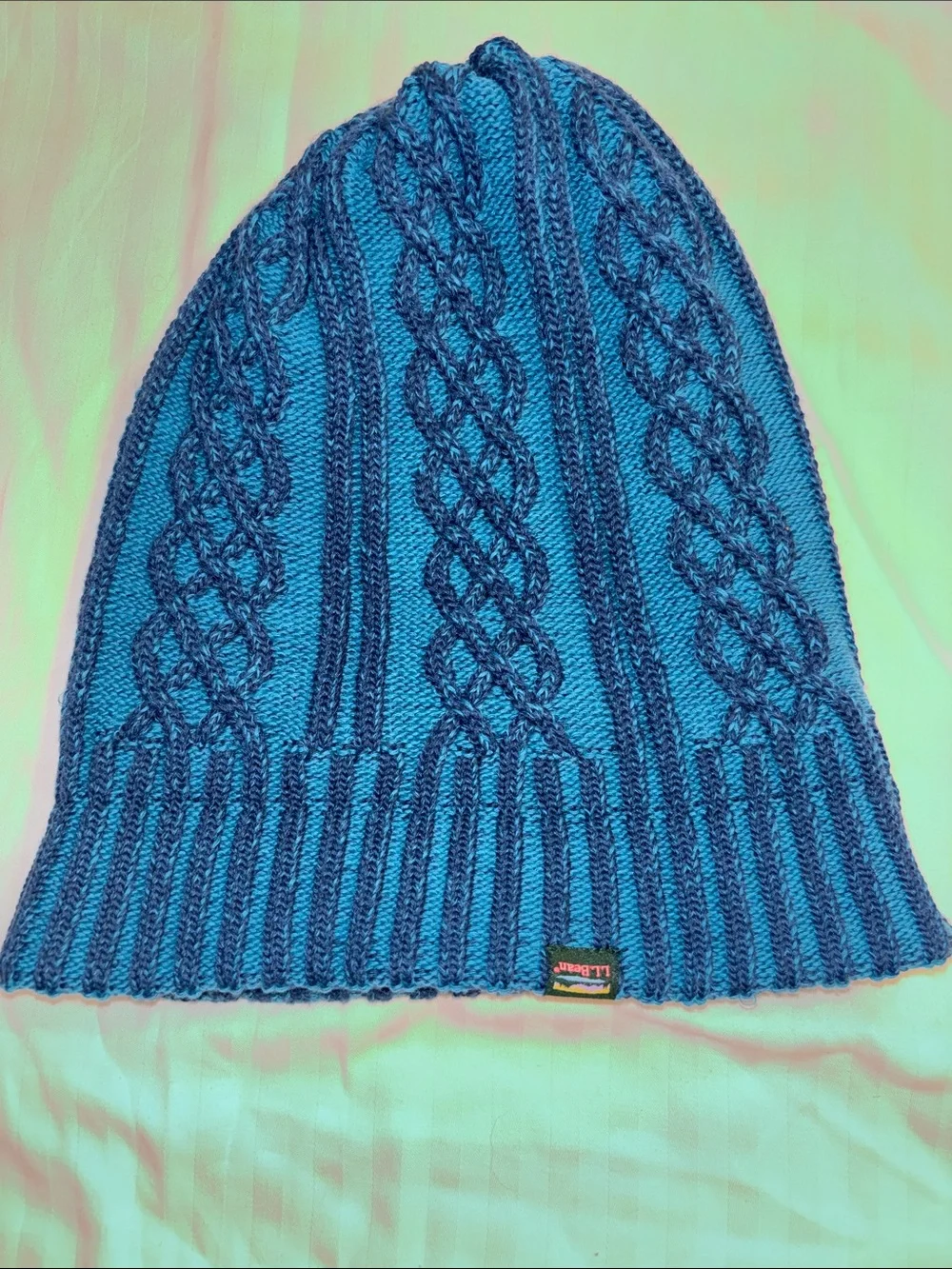 L.L. Bean Women’s Cable Knit Beanie in Teal and Navy